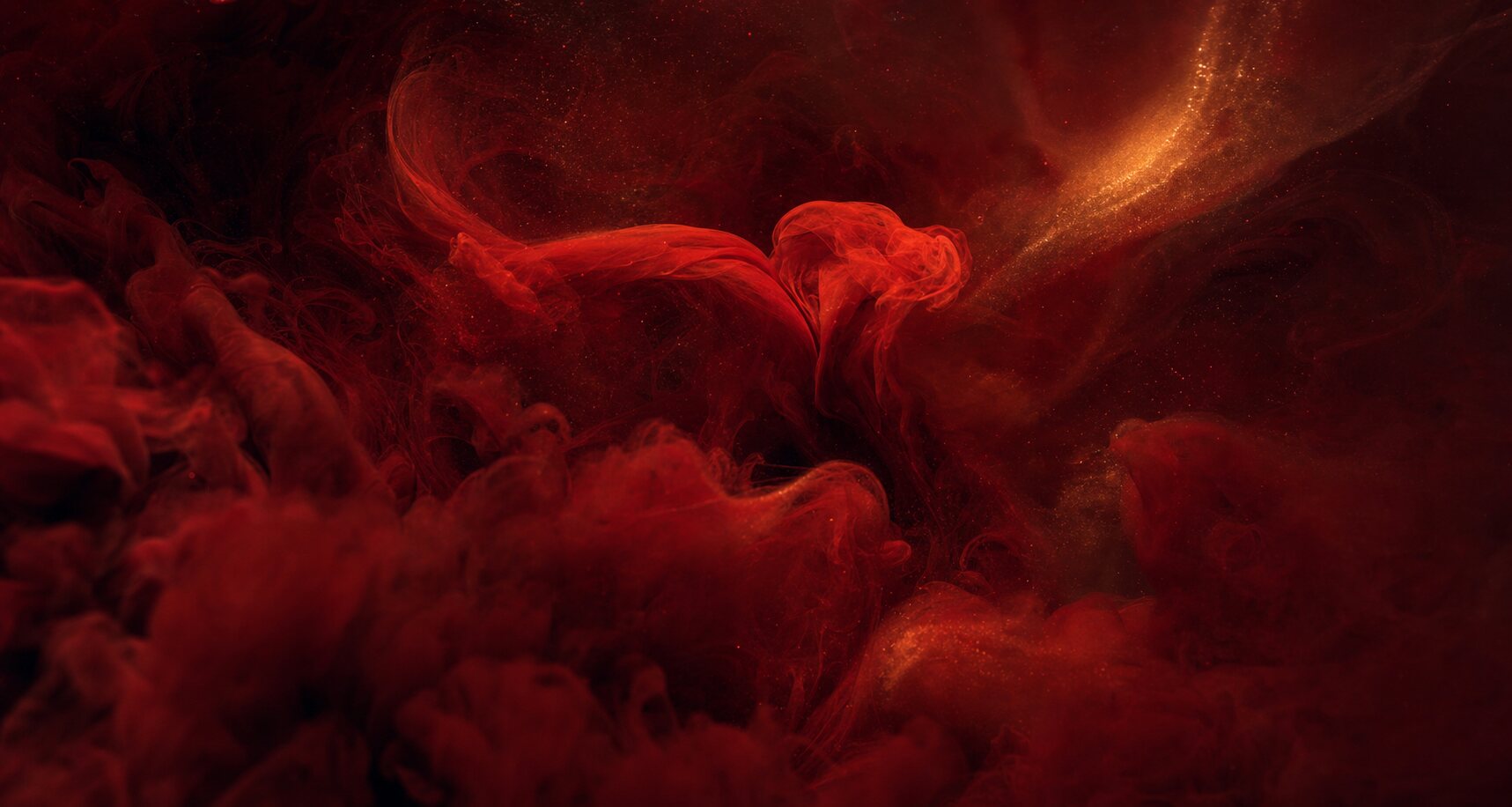 Deep red pigment dispersing in a polymer melt